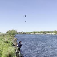 Chanook haalt water uit Maas te Reuver
