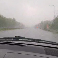 Stortregen op de A7