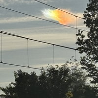 Iriserende wolk boven Oisterwijk